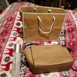 Small Michael Kore Purse with MK leather cleaner